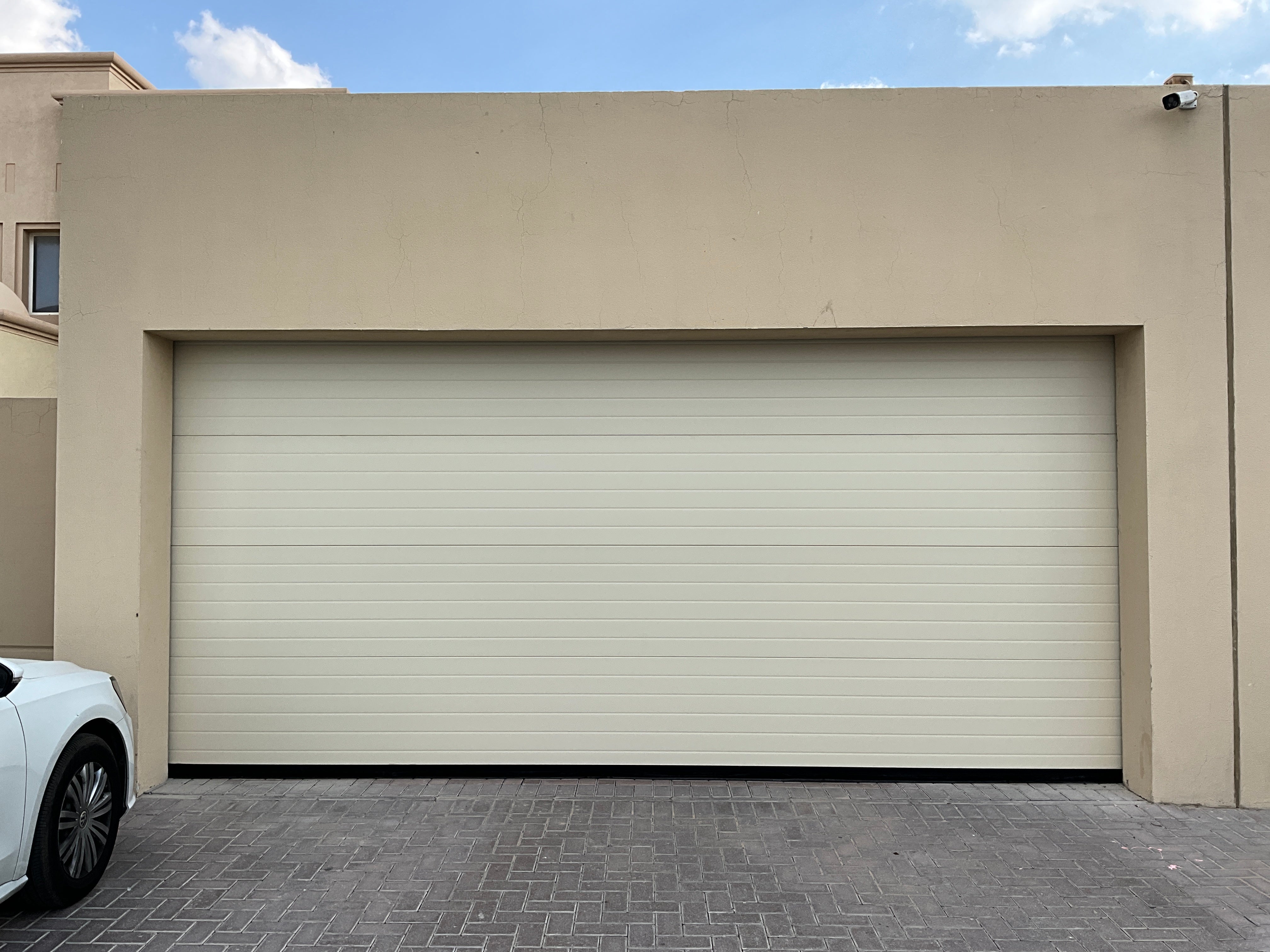 Beige Overhead Door - باب كراج لون بيج - BAB ALSARAY AUTOMATIC GATES & BARRIERS TRADING LLC