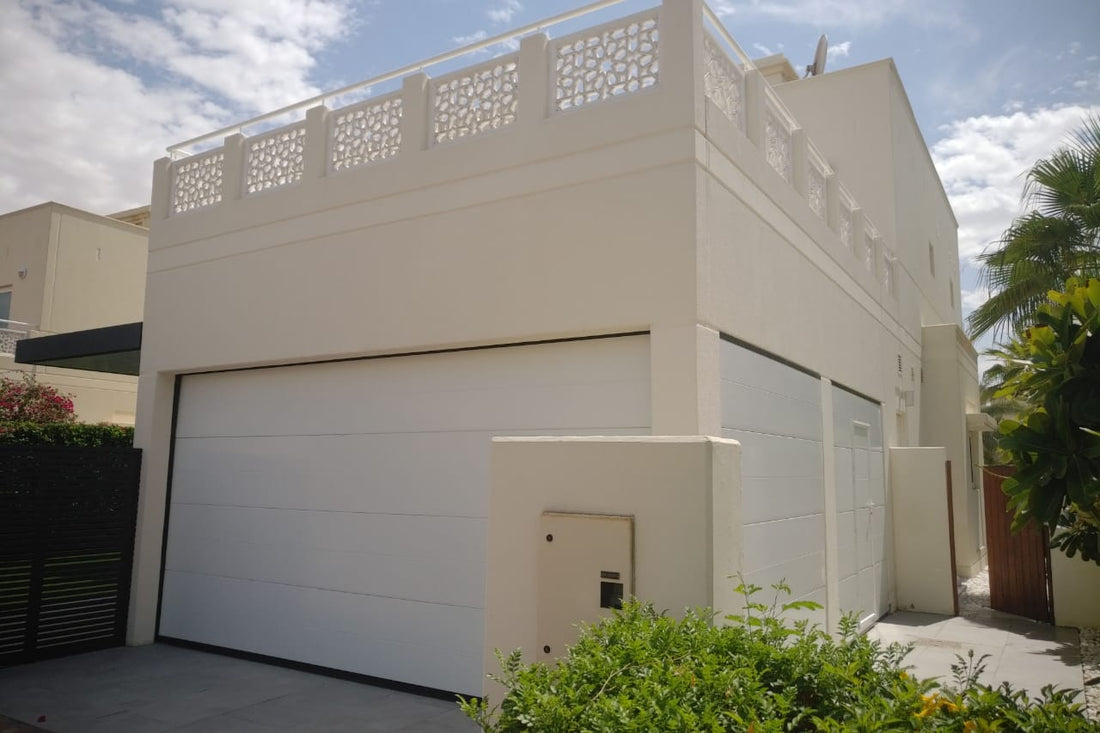 Sectional garage door with authentic DOCO hardware and Italpannelli panels installed by BAB ALSARAY in UAE