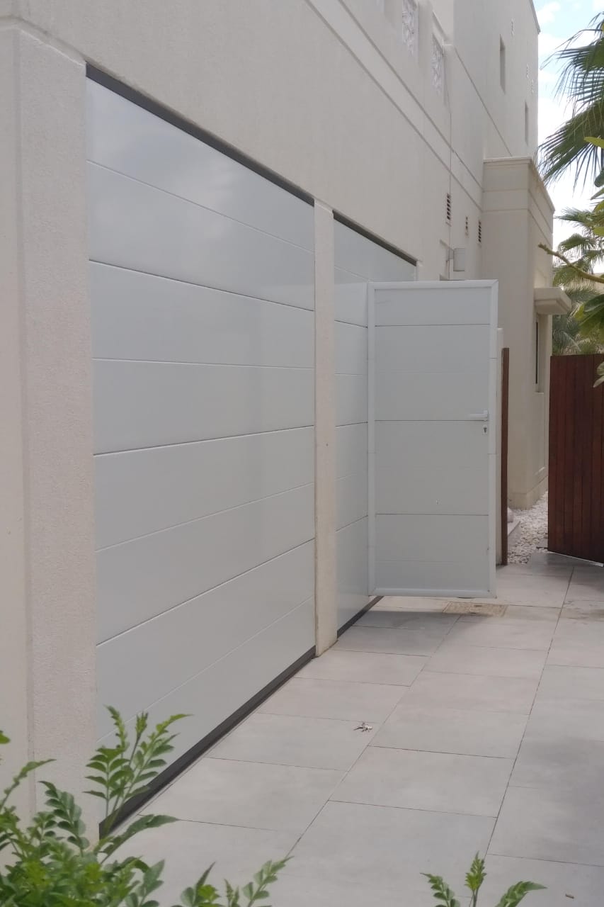 Completed sectional garage door project in UAE using Italpannelli panels — BAB ALSARAY